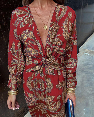 Elegancka sukienka w stylu vintage z dekoltem w kształcie litery V i długim rękawem